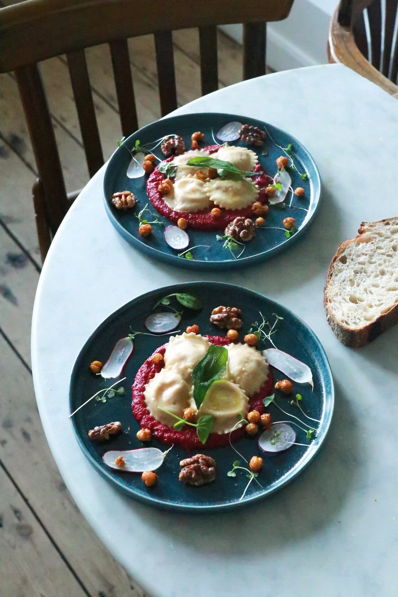 Ricotta and spinach ravioli on a bed of beetroot hummus 1 Ricotta and spinach ravioli on a bed of beetroot hummus